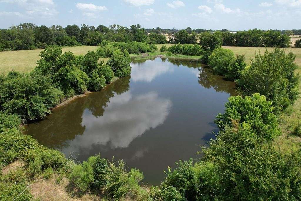 66.7 Acres of Agricultural Land with Home for Sale in Crockett, Texas