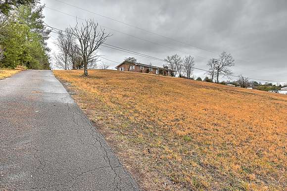 4.9 Acres of Residential Land with Home for Sale in Mosheim, Tennessee