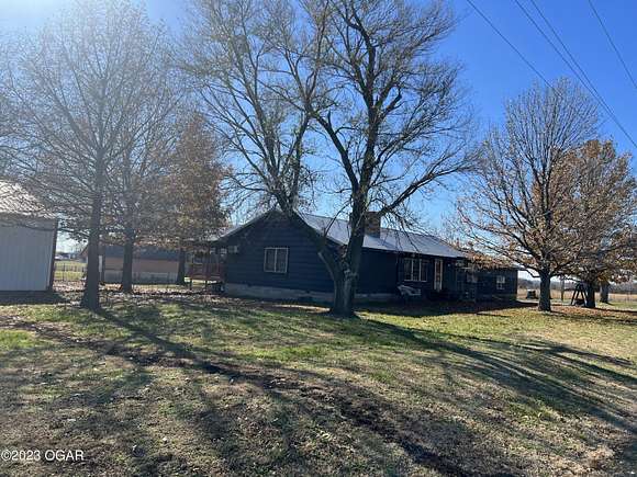 76 Acres of Land with Home for Sale in Stella, Missouri