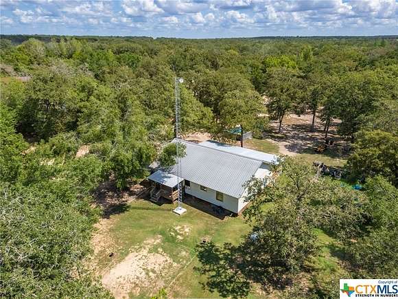 14.009 Acres of Land with Home for Sale in Milano, Texas