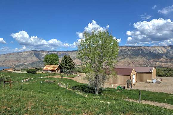 390 Acres of Land with Home for Sale in Parachute, Colorado