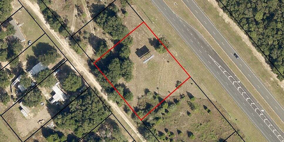 0.92 Acres of Commercial Land for Sale in Milton, Florida