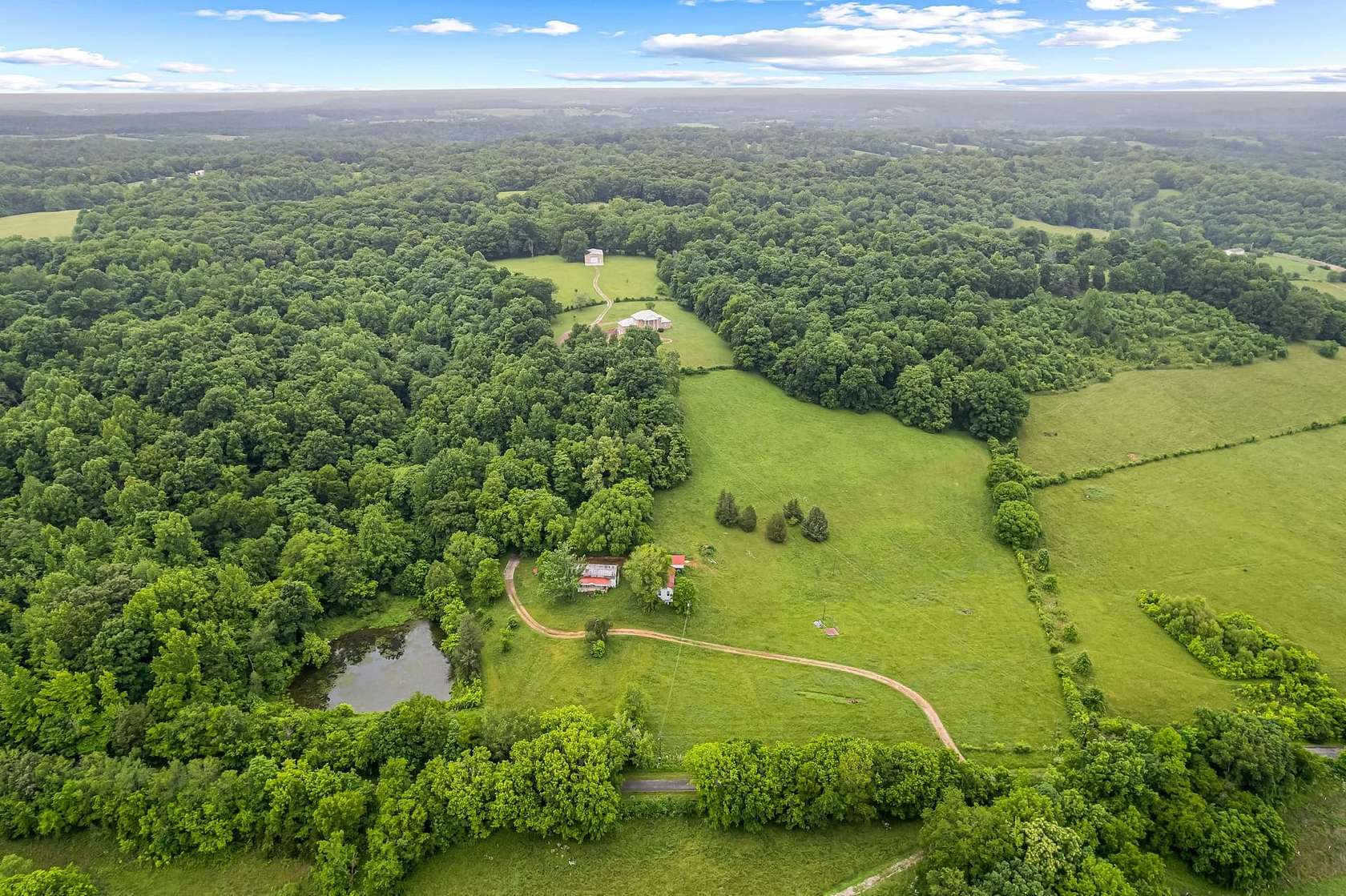 54.7 Acres of Land with Home for Sale in Shady Grove, Tennessee