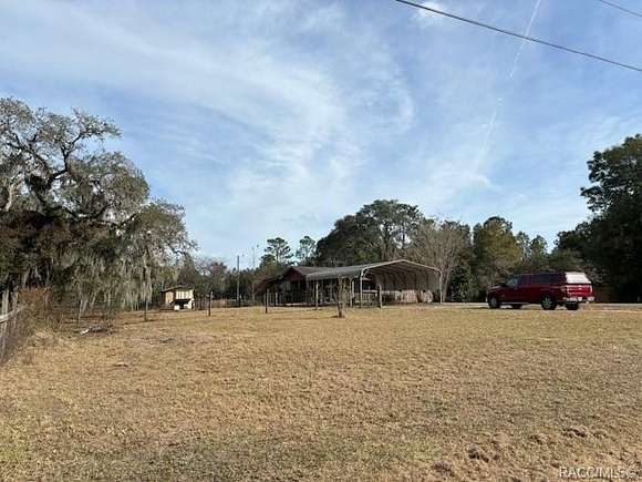 2.34 Acres of Residential Land with Home for Sale in Dunnellon, Florida