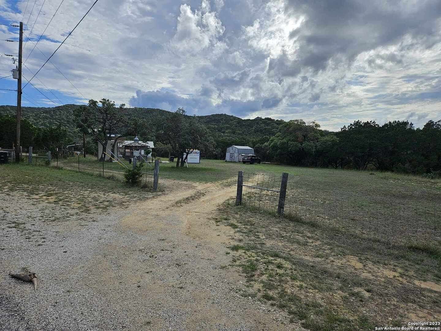 10.8 Acres of Land with Home for Sale in Pipe Creek, Texas