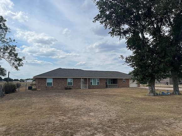 5 Acres of Land with Home for Sale in Sealy, Texas