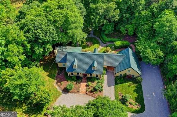 24.8 Acres of Agricultural Land with Home for Sale in Alpharetta, Georgia
