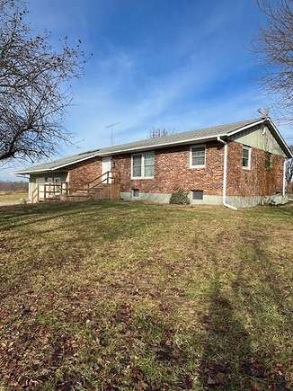 76 Acres of Agricultural Land with Home for Sale in Bevier, Missouri
