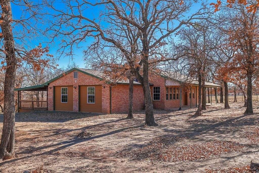 10.5 Acres of Land with Home for Sale in Poolville, Texas