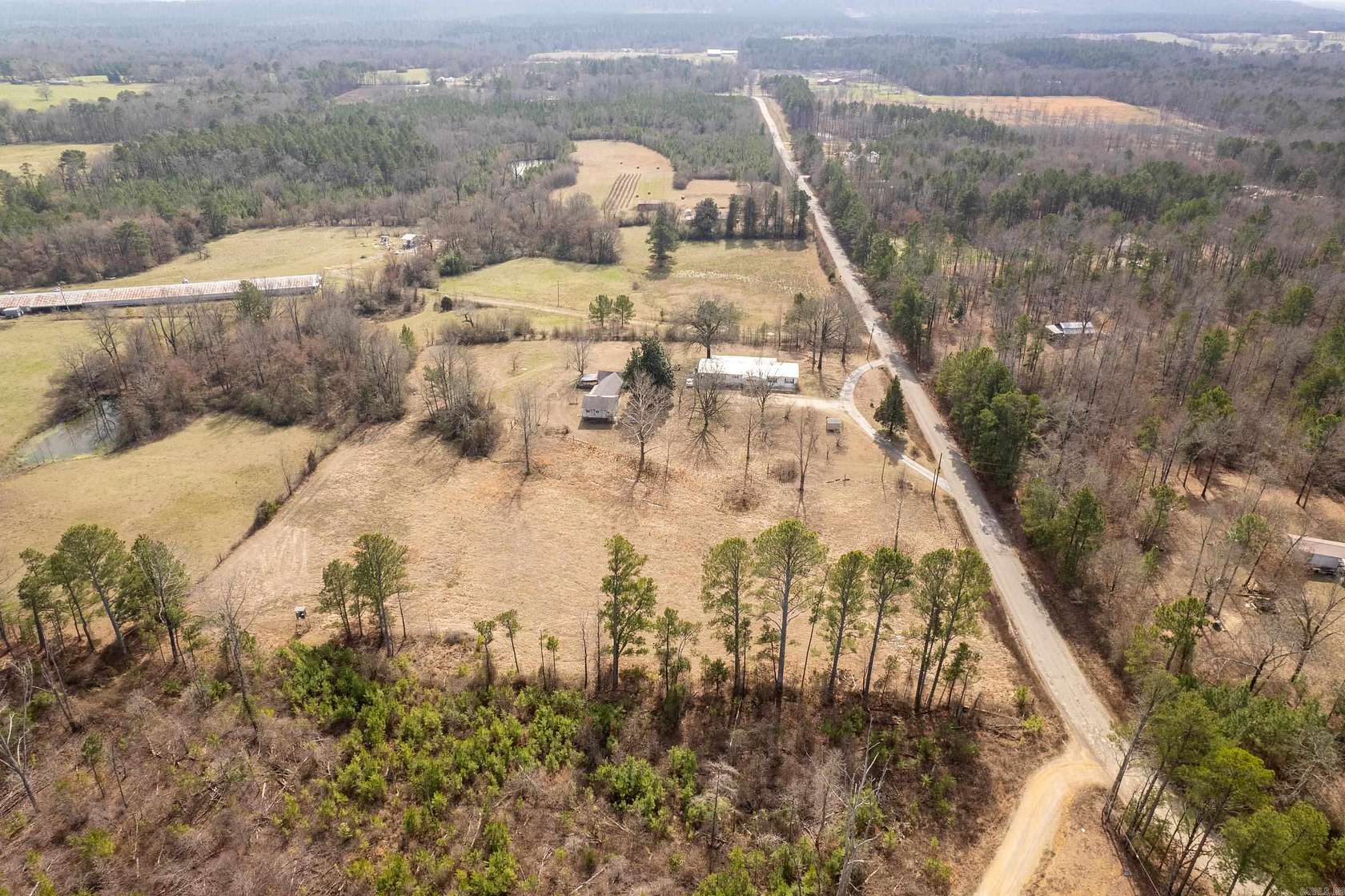 5.1 Acres of Residential Land with Home for Sale in Bonnerdale, Arkansas