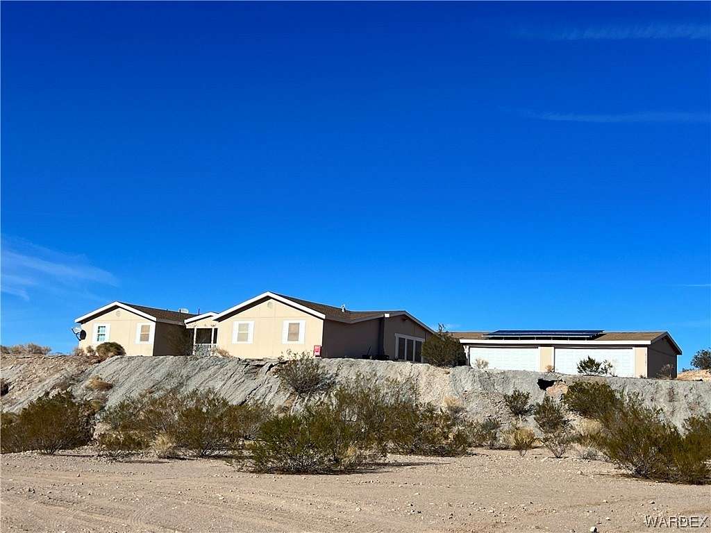 2.2 Acres of Residential Land with Home for Sale in White Hills, Arizona