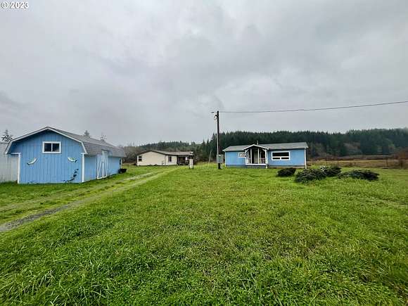 6.5 Acres of Residential Land with Home for Sale in Coquille, Oregon
