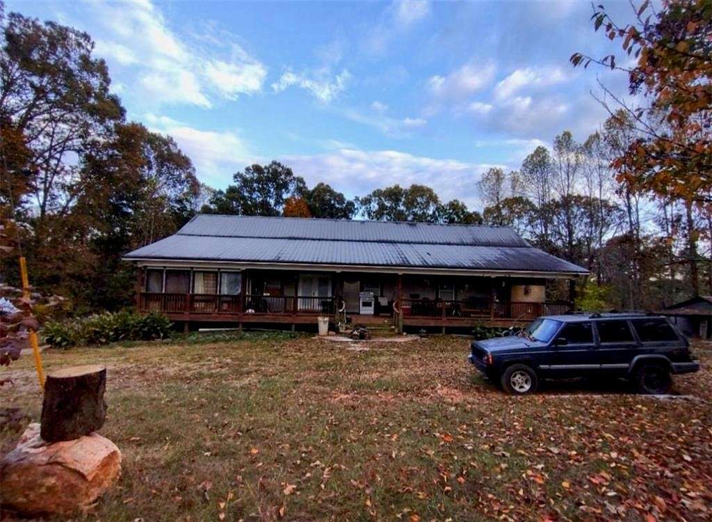 2.6 Acres of Residential Land with Home for Sale in Ball Ground, Georgia