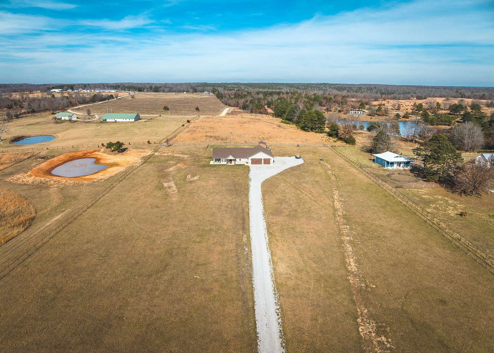 15 Acres of Land with Home for Sale in Raymondville, Missouri