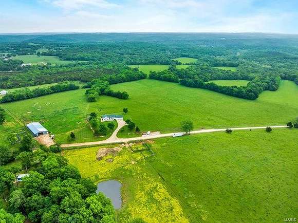 110 Acres of Agricultural Land with Home for Sale in Blackwell, Missouri