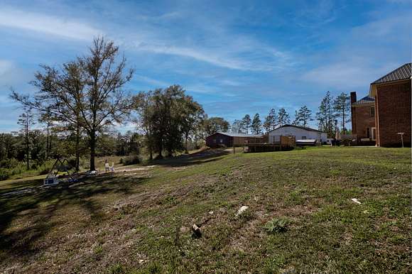 Around 5 acres is fenced for horses.