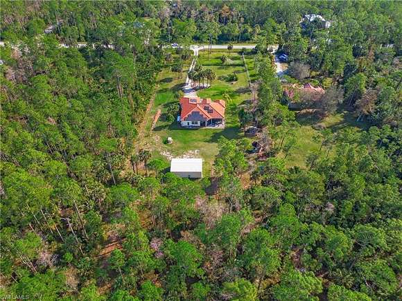 2.6 Acres of Residential Land with Home for Sale in Naples, Florida