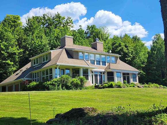10.08 Acres of Land with Home for Sale in Stowe, Vermont