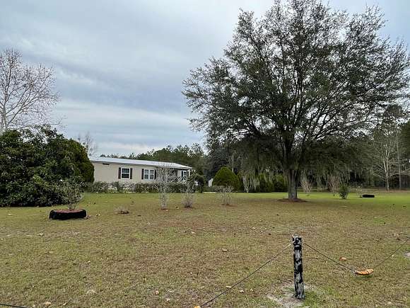 4.7 Acres of Land with Home for Sale in Trenton, Florida