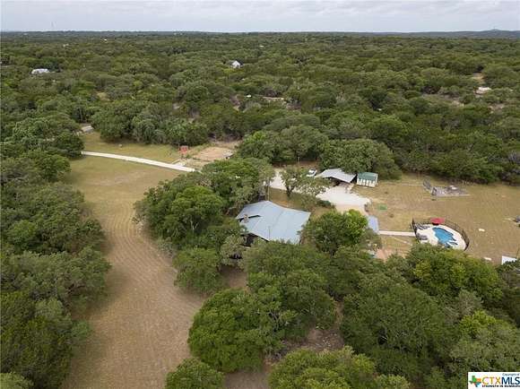 10 Acres of Residential Land with Home for Sale in Driftwood, Texas