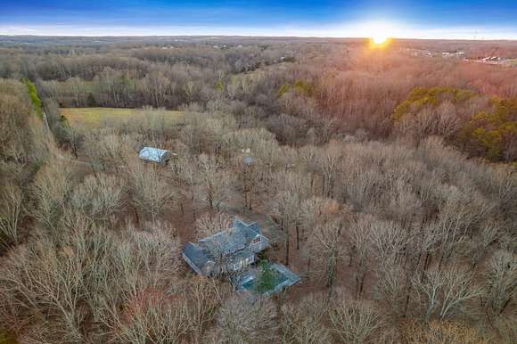 70.6 Acres of Land with Home for Sale in Burns, Tennessee