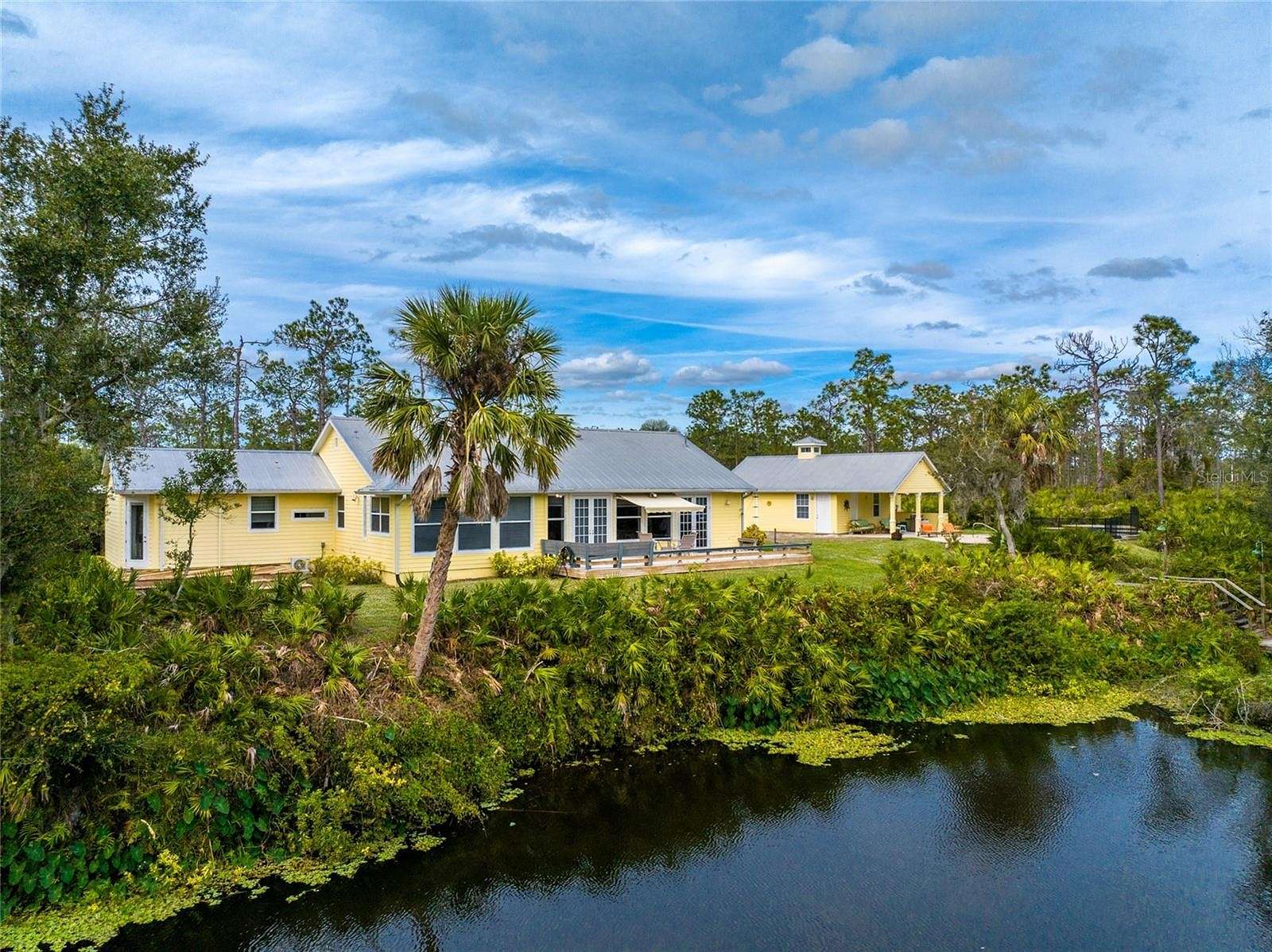 11.9 Acres of Land with Home for Sale in Punta Gorda, Florida