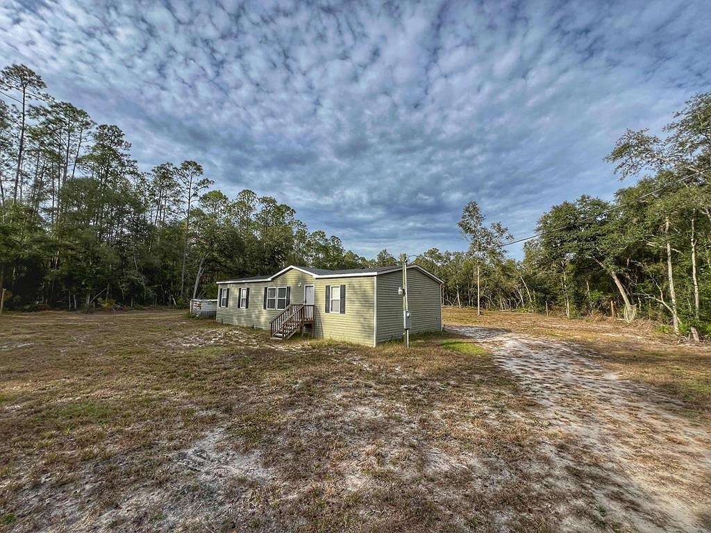 2.1 Acres of Land with Home for Sale in Old Town, Florida