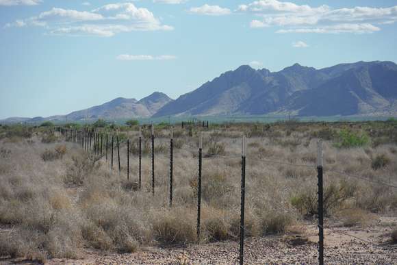 View from the southwest corner of the acreage to the southwest and mountains in Arizona.