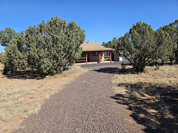 1.1 Acres of Residential Land with Home for Sale in Concho, Arizona