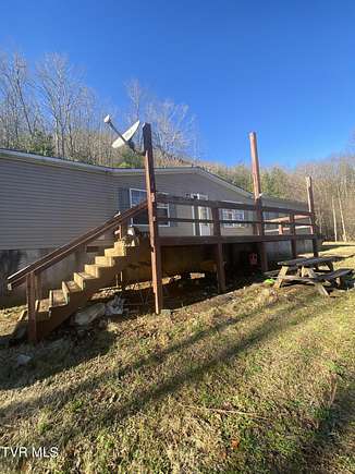 15.2 Acres of Recreational Land with Home for Sale in Hampton, Tennessee