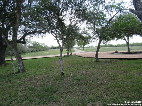 7.4 Acres of Land with Home for Sale in Hondo, Texas