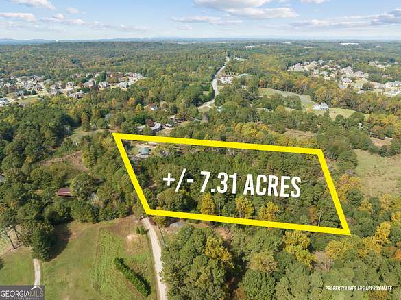 7.1 Acres of Residential Land with Home for Sale in Flowery Branch, Georgia