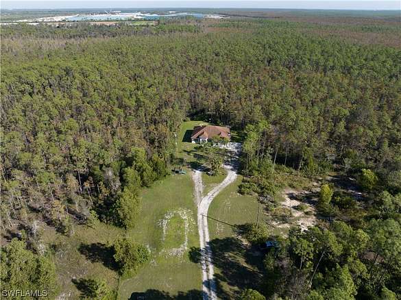 9.7 Acres of Land with Home for Sale in Bonita Springs, Florida