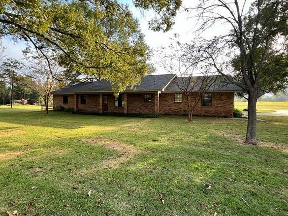 14.8 Acres of Land with Home for Sale in Daingerfield, Texas