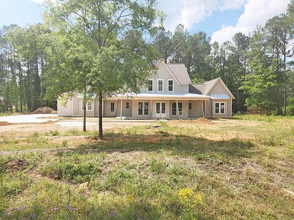2.3 Acres of Residential Land with Home for Sale in Leesburg, Georgia
