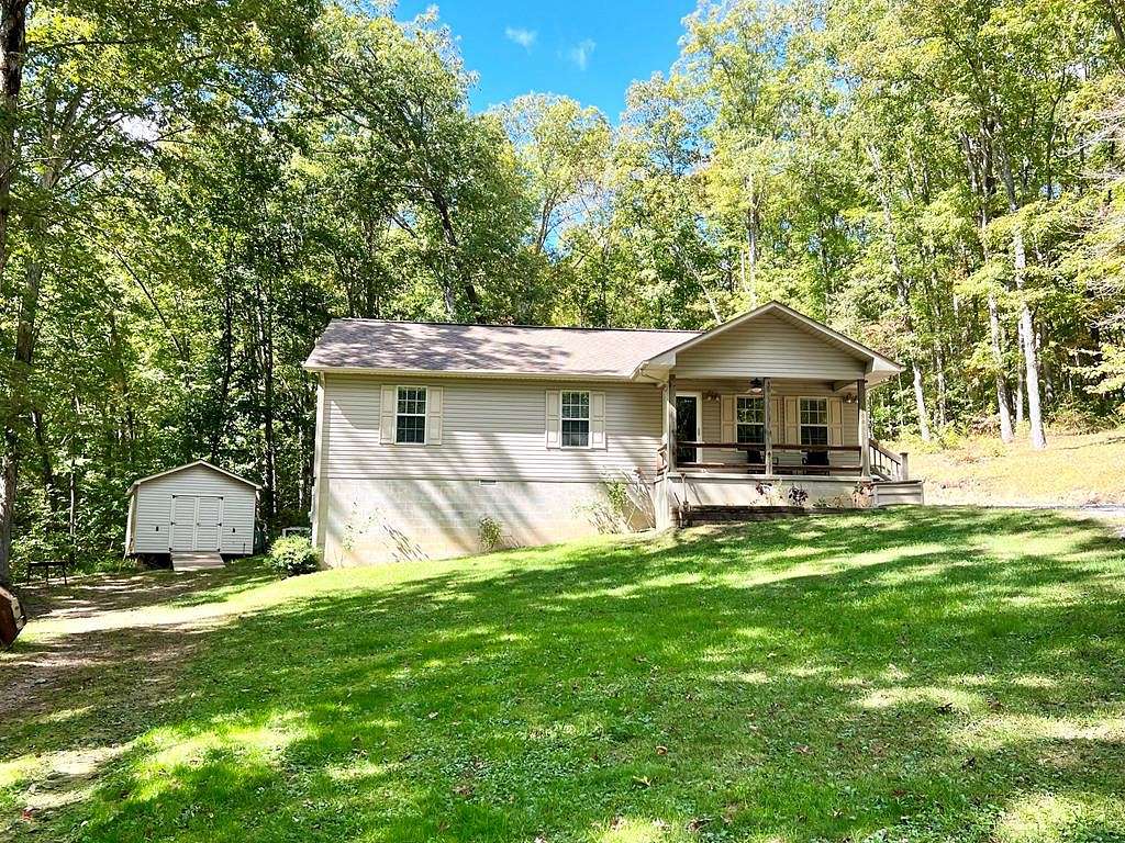 5.3 Acres of Residential Land with Home for Sale in Crawford, Tennessee