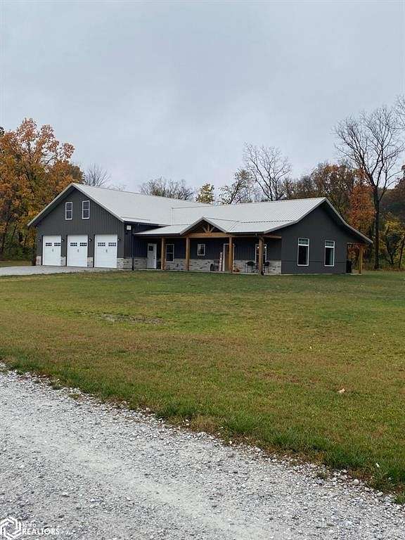 4.9 Acres of Residential Land with Home for Sale in Argyle, Iowa