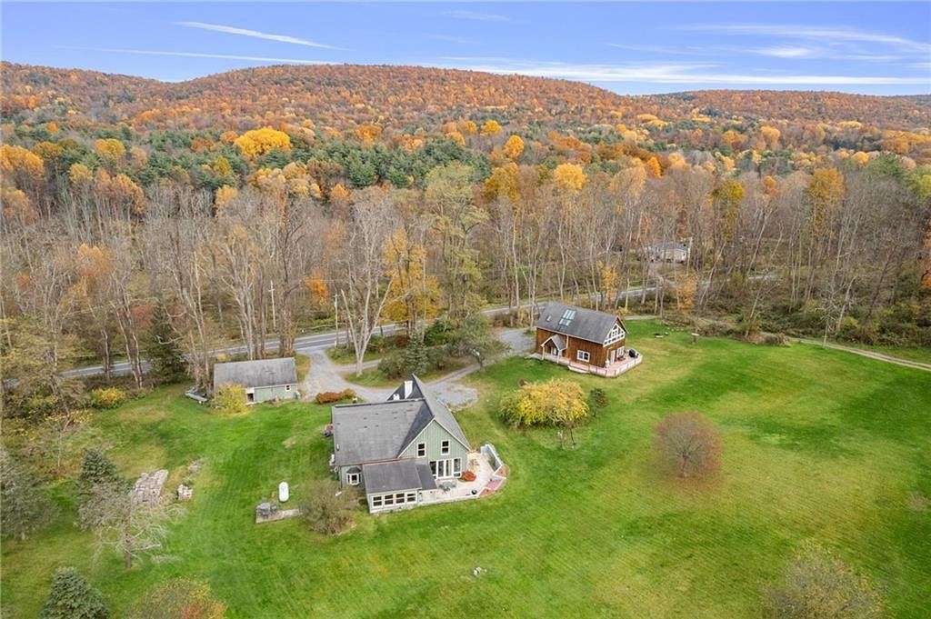 64 Acres of Recreational Land with Home for Sale in Newfield, New York