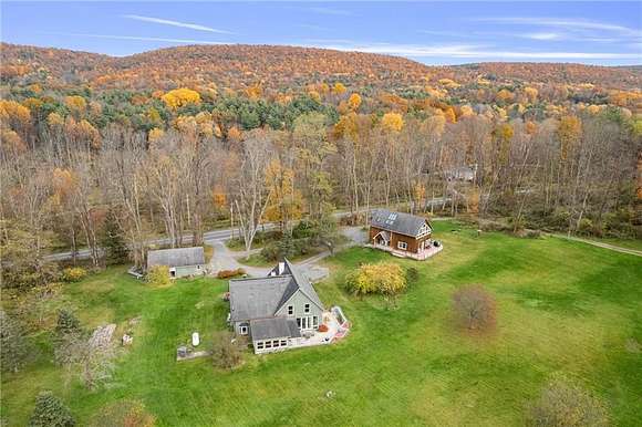 64 Acres of Land with Home for Sale in Newfield, New York