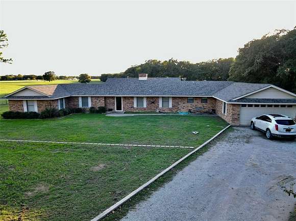 30.2 Acres of Agricultural Land with Home for Sale in Sunset, Texas