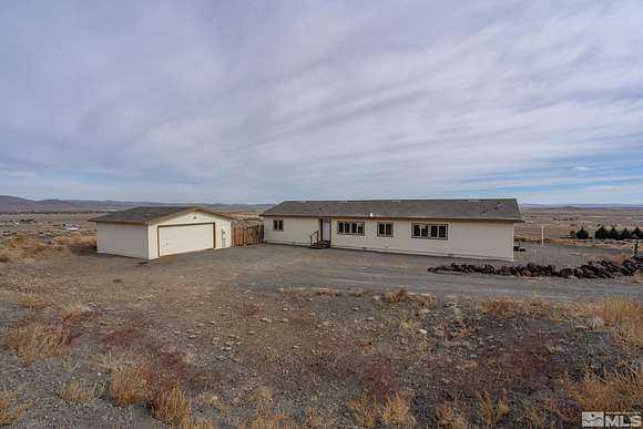 4.8 Acres of Residential Land with Home for Sale in Silver Springs, Nevada