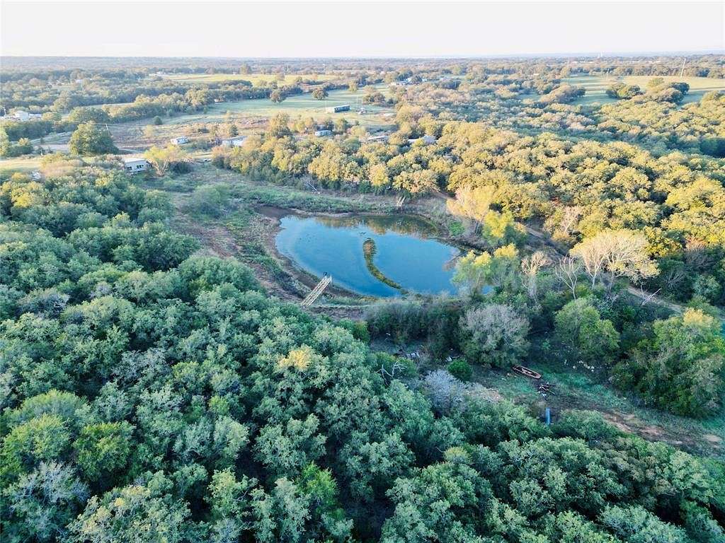 21.9 Acres of Recreational Land with Home for Sale in Whitney, Texas