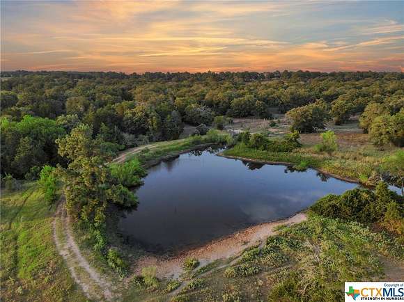 23.979 Acres of Land with Home for Sale in Bastrop, Texas