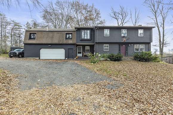25.7 Acres of Land with Home for Sale in Uxbridge, Massachusetts