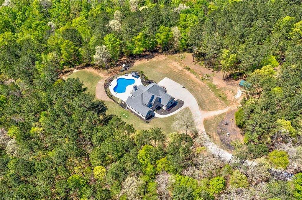 11.3 Acres of Land with Home for Sale in McDonough, Georgia