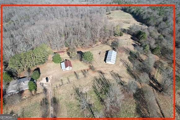71.9 Acres of Land with Home for Sale in Maysville, Georgia