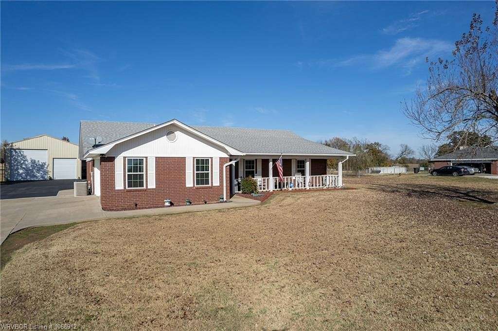 1.3 Acres of Residential Land with Home for Sale in Muldrow, Oklahoma