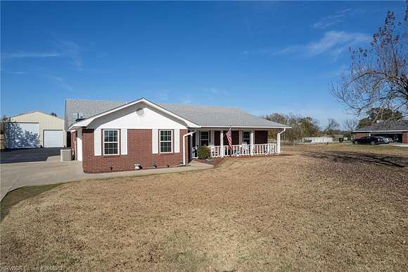 1.3 Acres of Residential Land with Home for Sale in Muldrow, Oklahoma