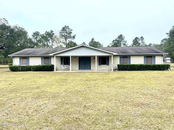 5.6 Acres of Residential Land with Home for Sale in Moss Point, Mississippi