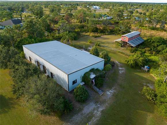 4.7 Acres of Residential Land with Home for Sale in Myakka City, Florida